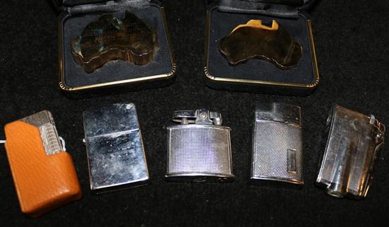 Dunhill plated bark-textured lighter with leather sleeve, 4 other lighters & 2 brass Australia presentation paperweights
